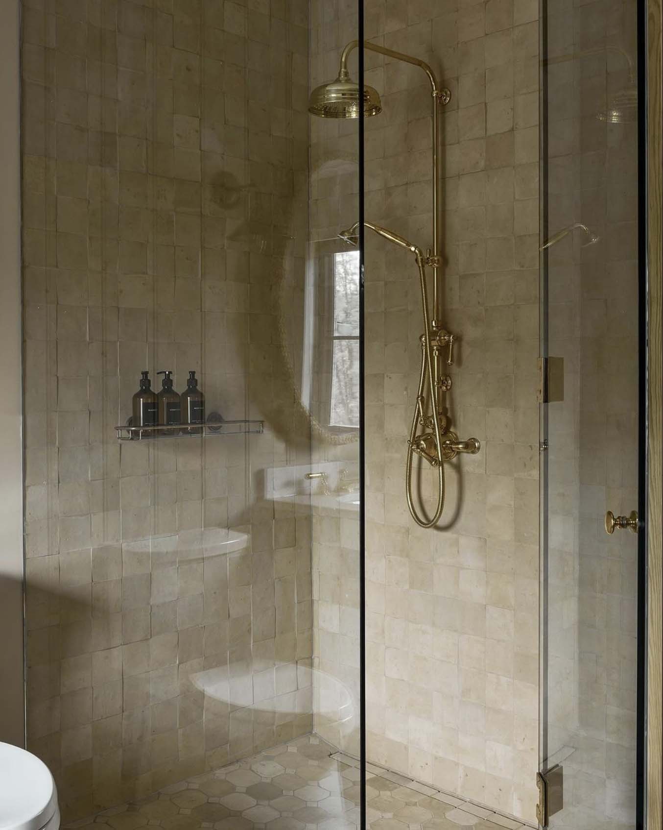 transitional style bathroom shower with zellige tiles