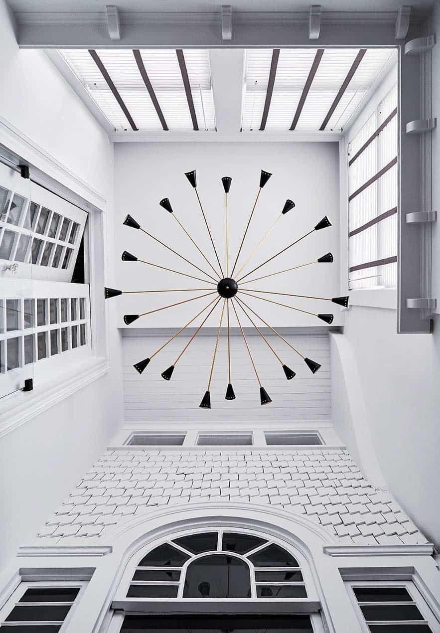 modern-staircase-looking-up-at-the-chandelier