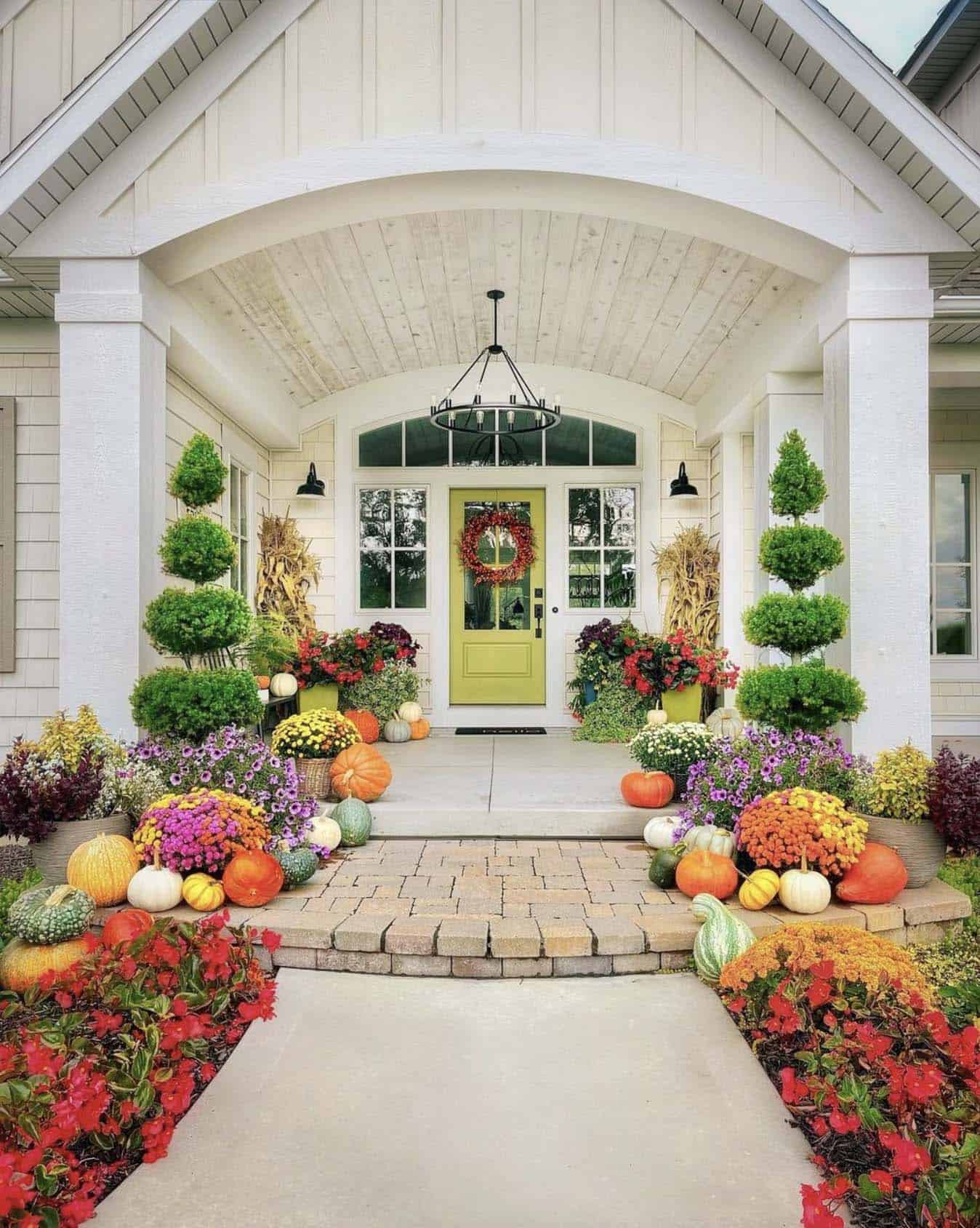 colorful fall decor on the front porch