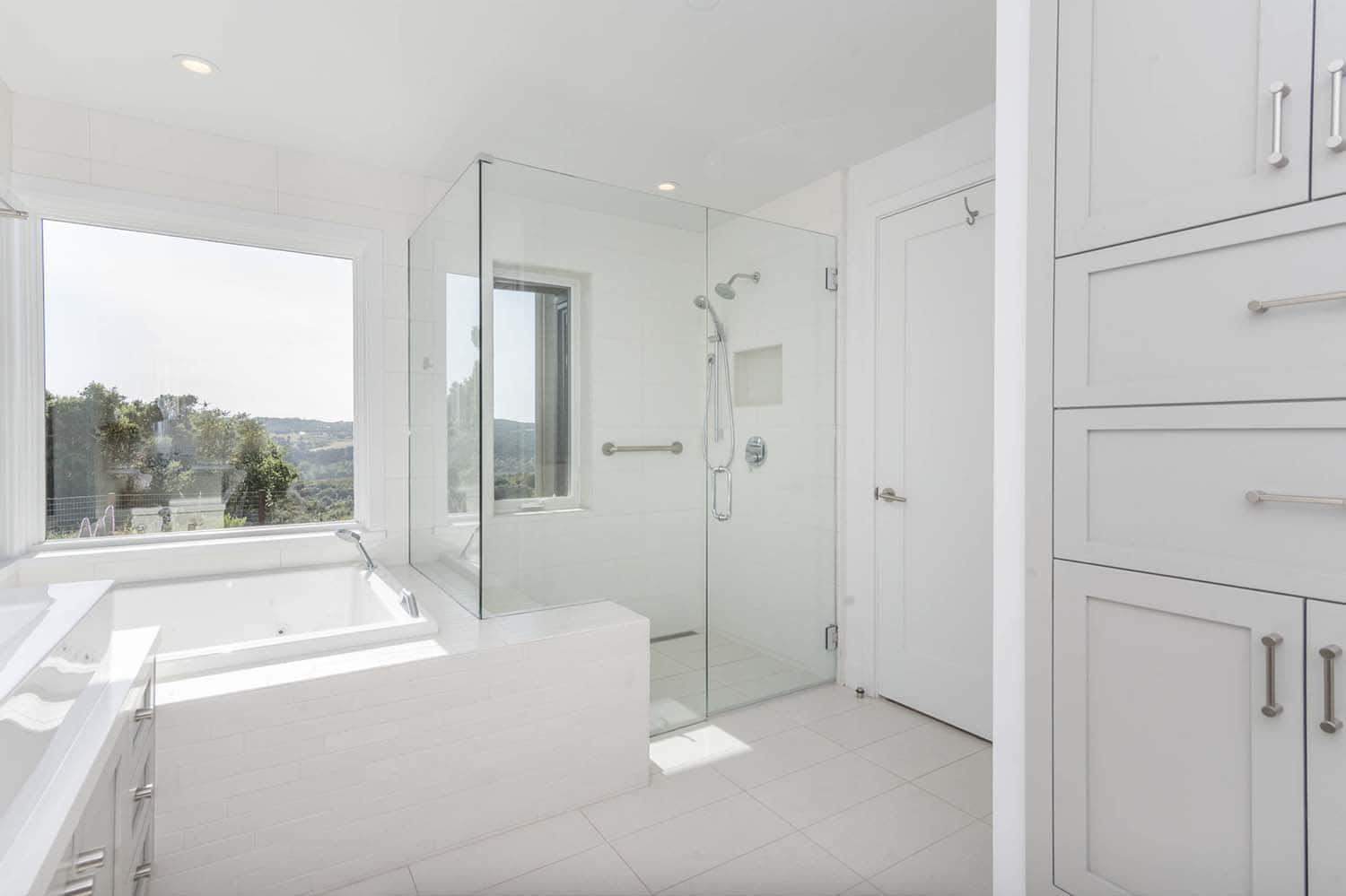 contemporary farmhouse bathroom shower and integrated tub