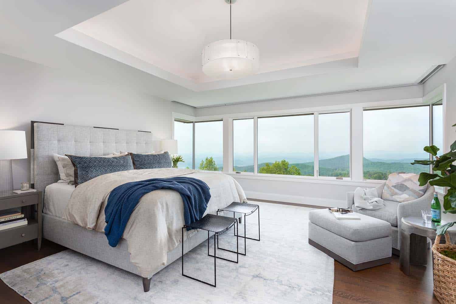 contemporary bedroom with large windows