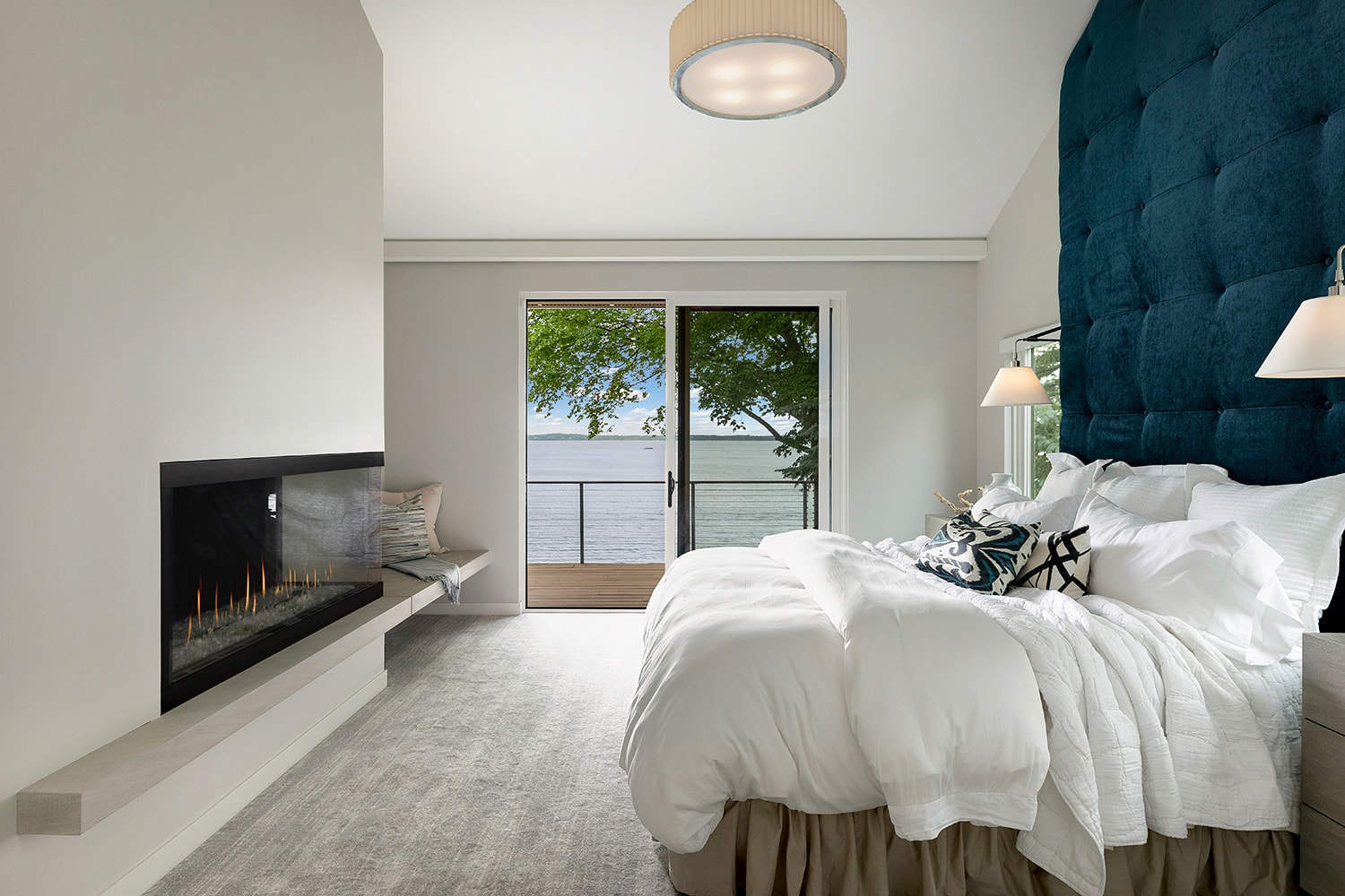contemporary bedroom with a fireplace