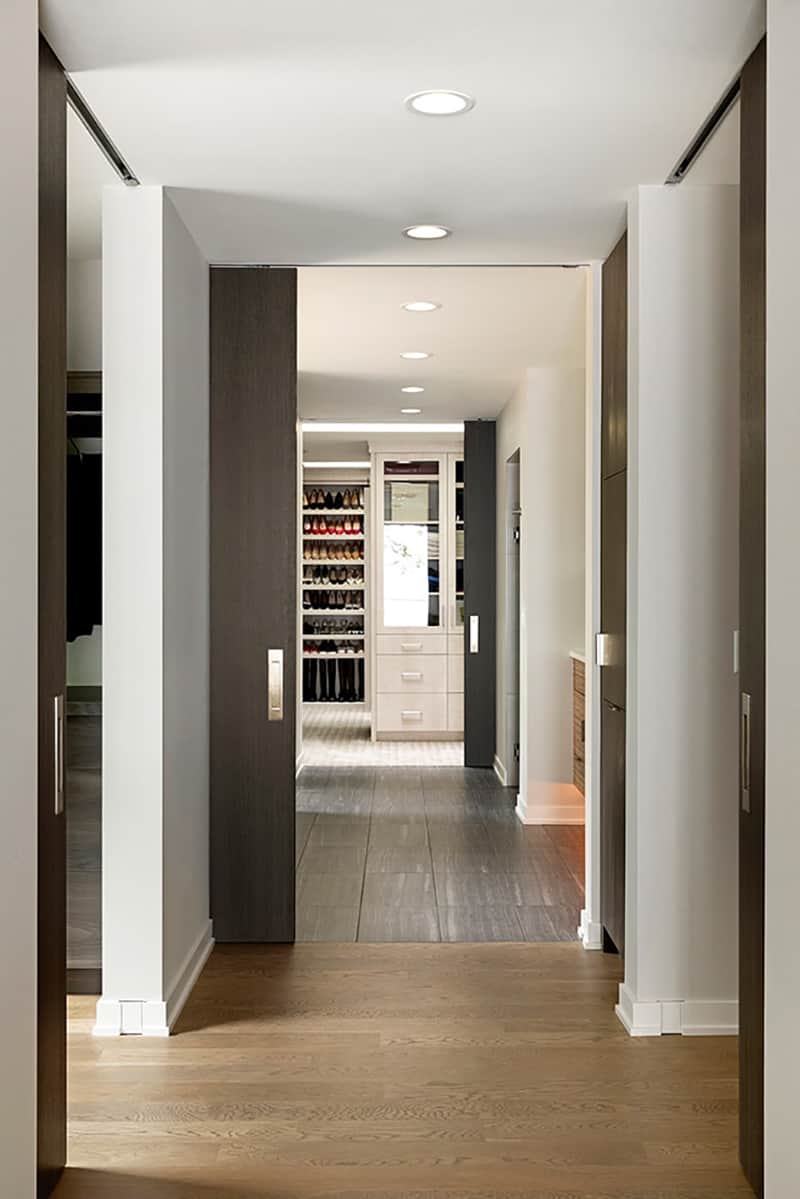 contemporary bedroom hallway leading to the walk-in closet