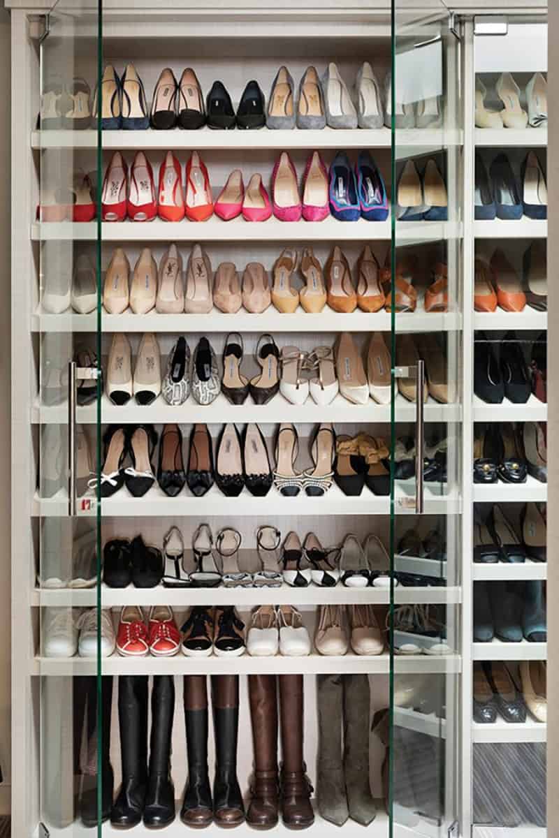 contemporary closet with a large shoe storage