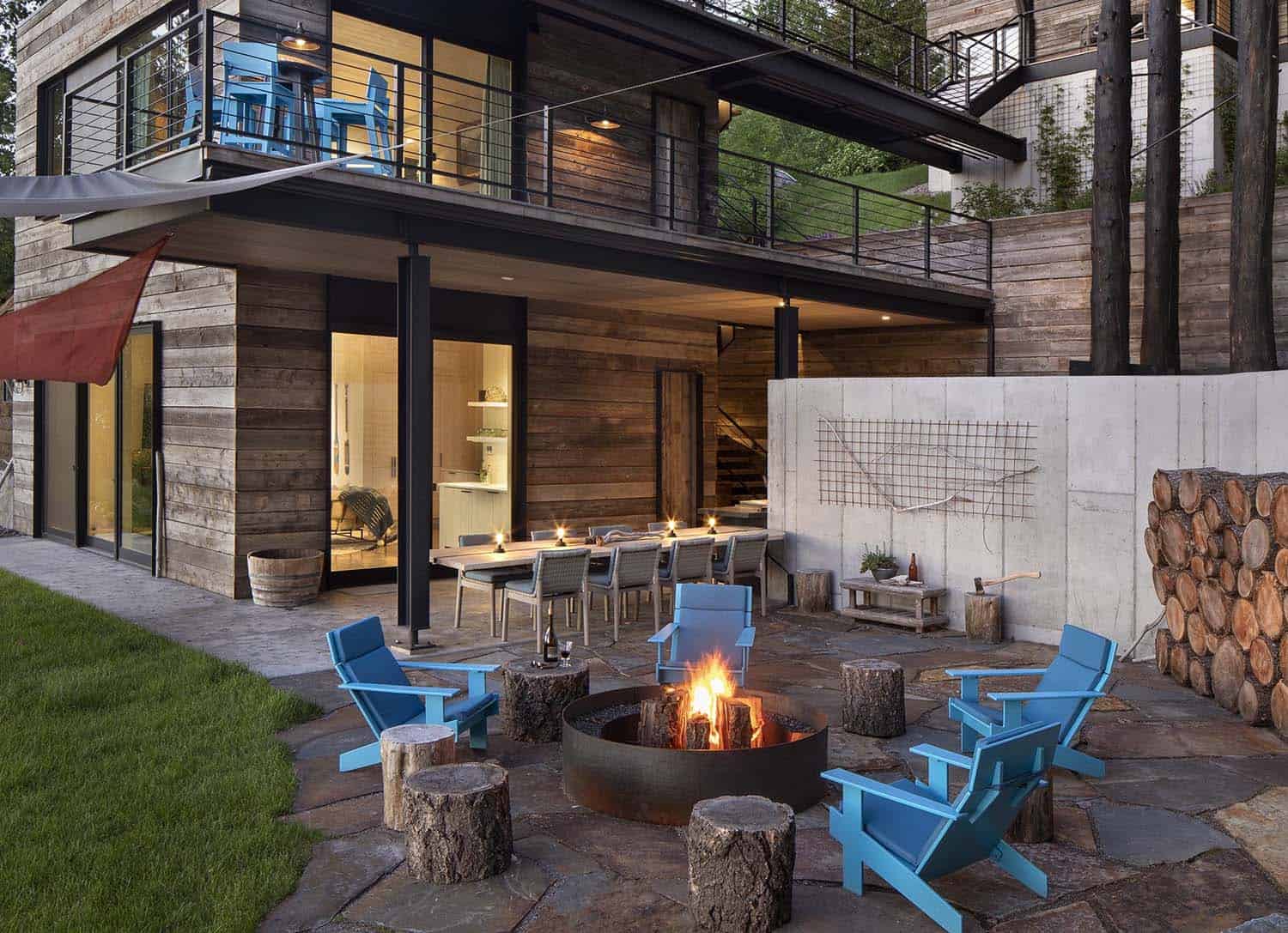 cottage modern lake house patio with a fire pit