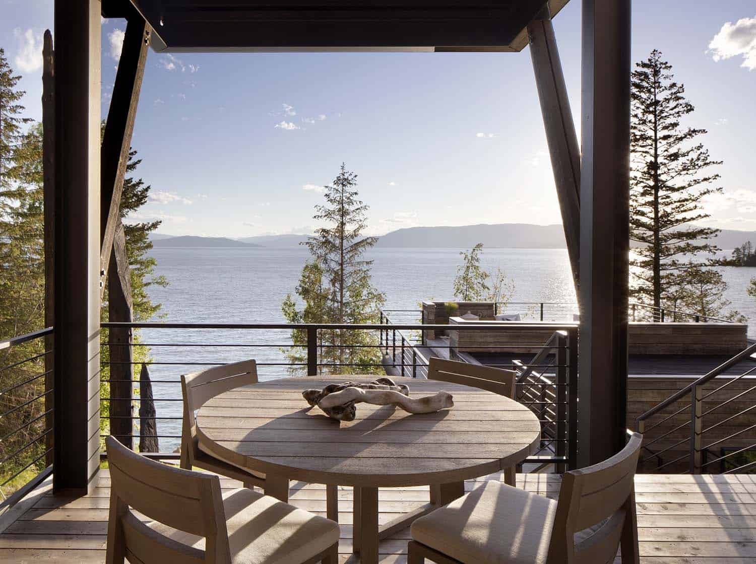cottage modern lake house deck with outdoor furniture