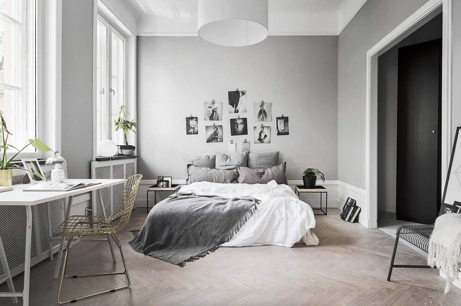 Scandinavian style bedroom with layers of pillows
