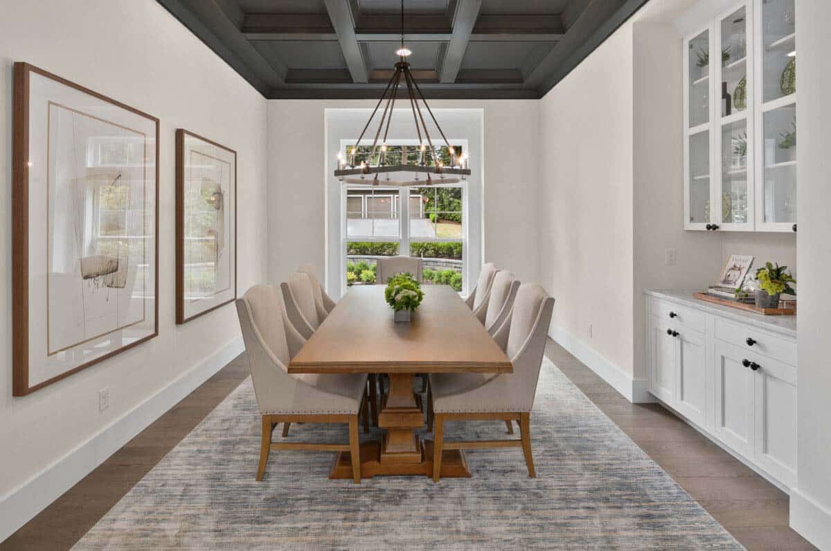 formal dining room with coffered ceiling and built-in hutch