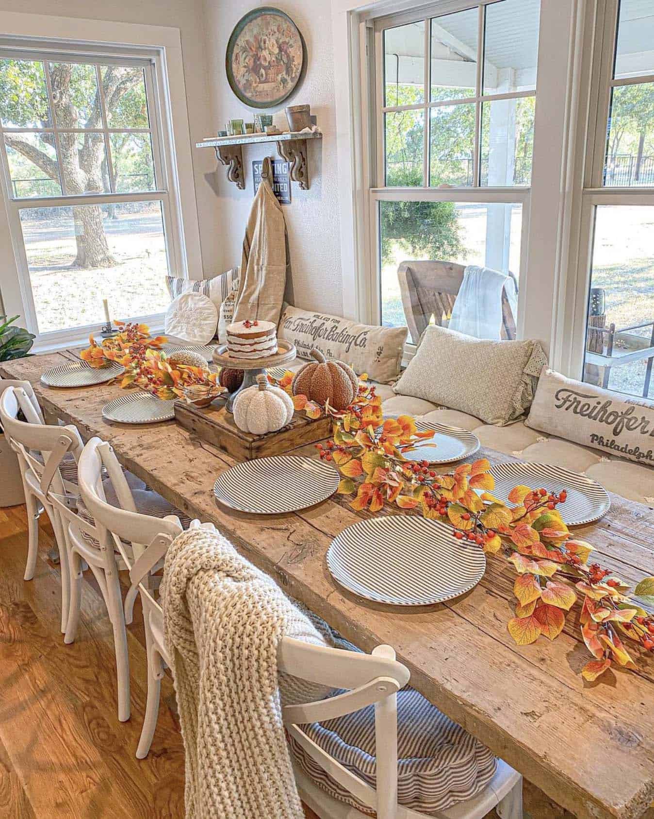 farmhouse style dining table decorated for fall