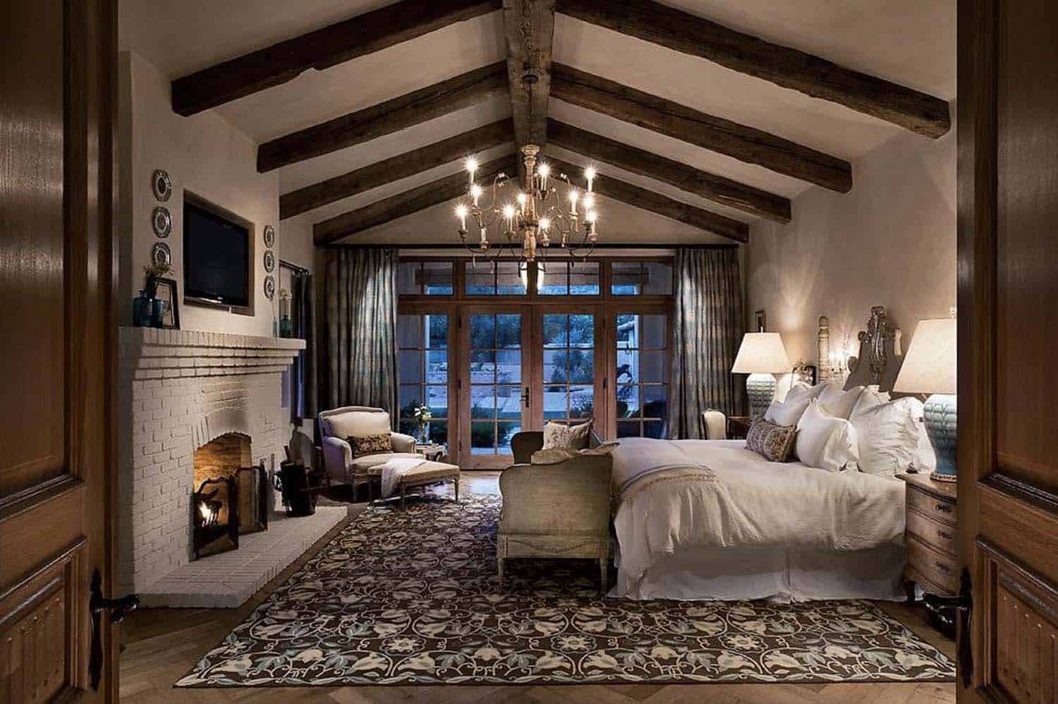 southwestern style bedroom with a fireplace