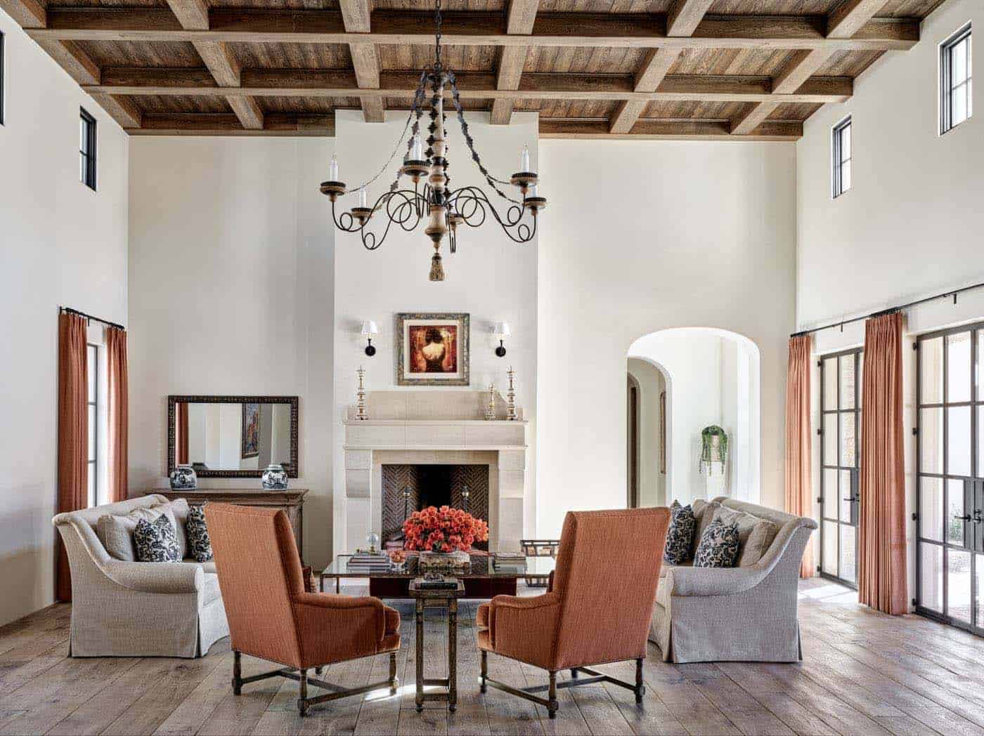 mediterranean style living room with a fireplace