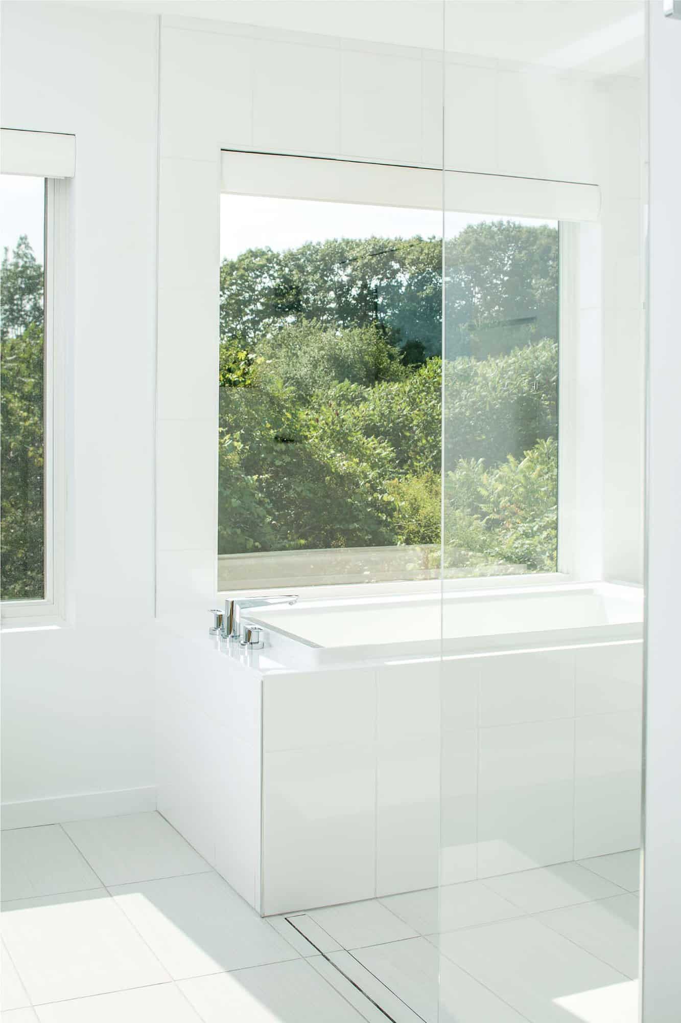 modern bathroom tub with a large window