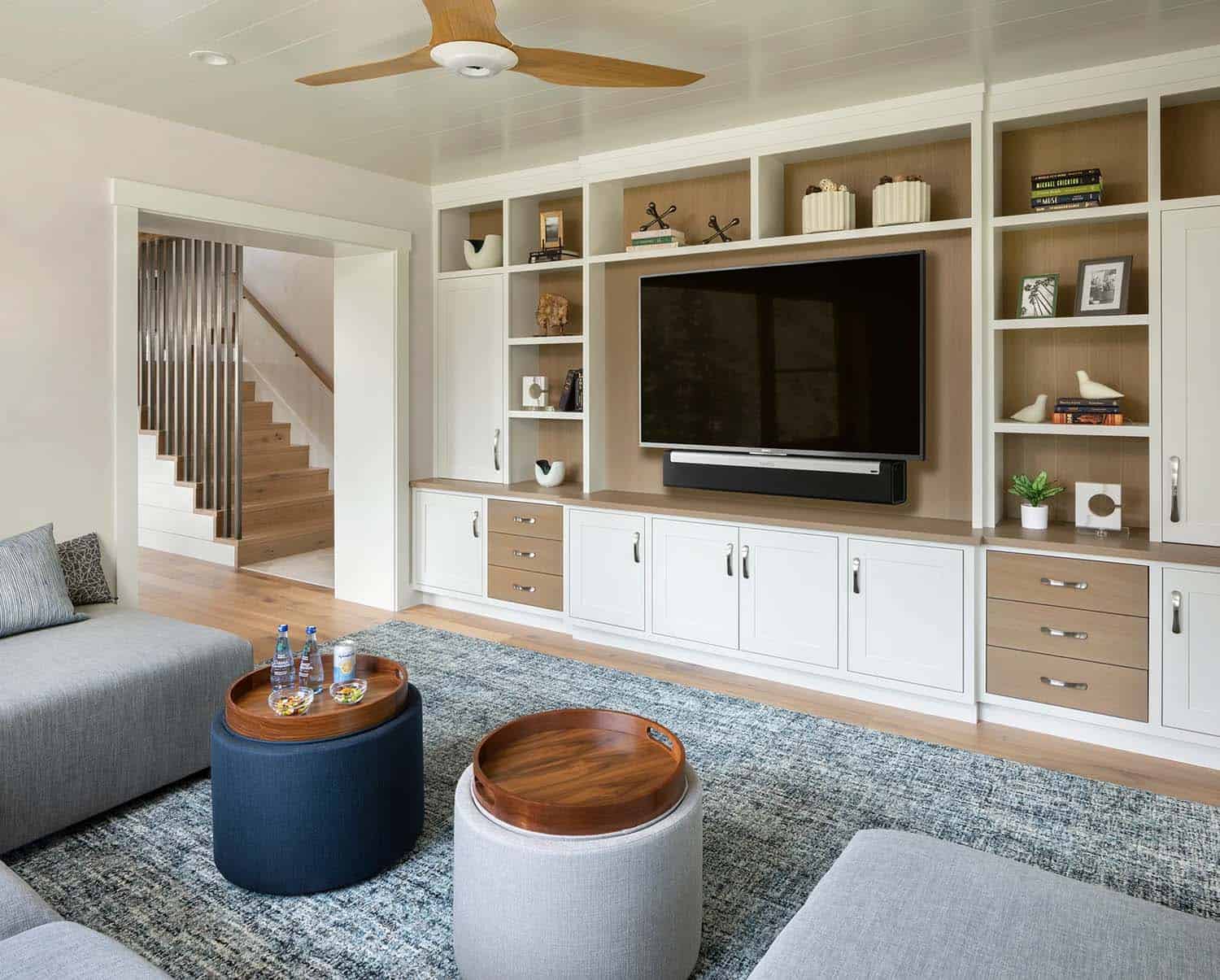 modern coastal family room with built-in entertaining unit