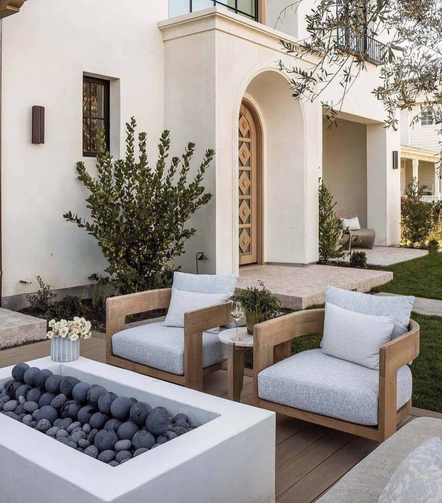 modern Spanish style home patio with a fire pit