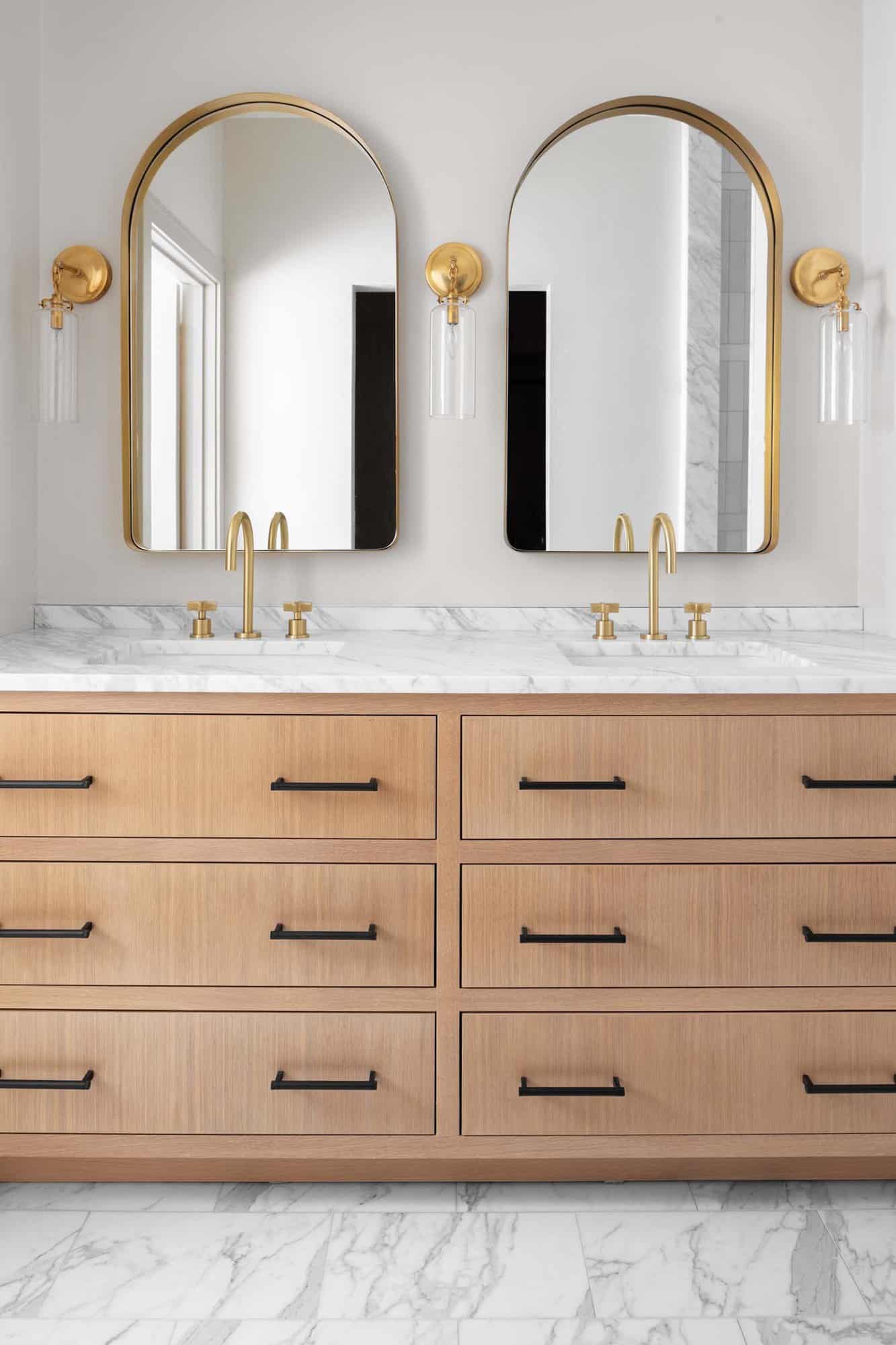 modern bathroom with a light wood vanity