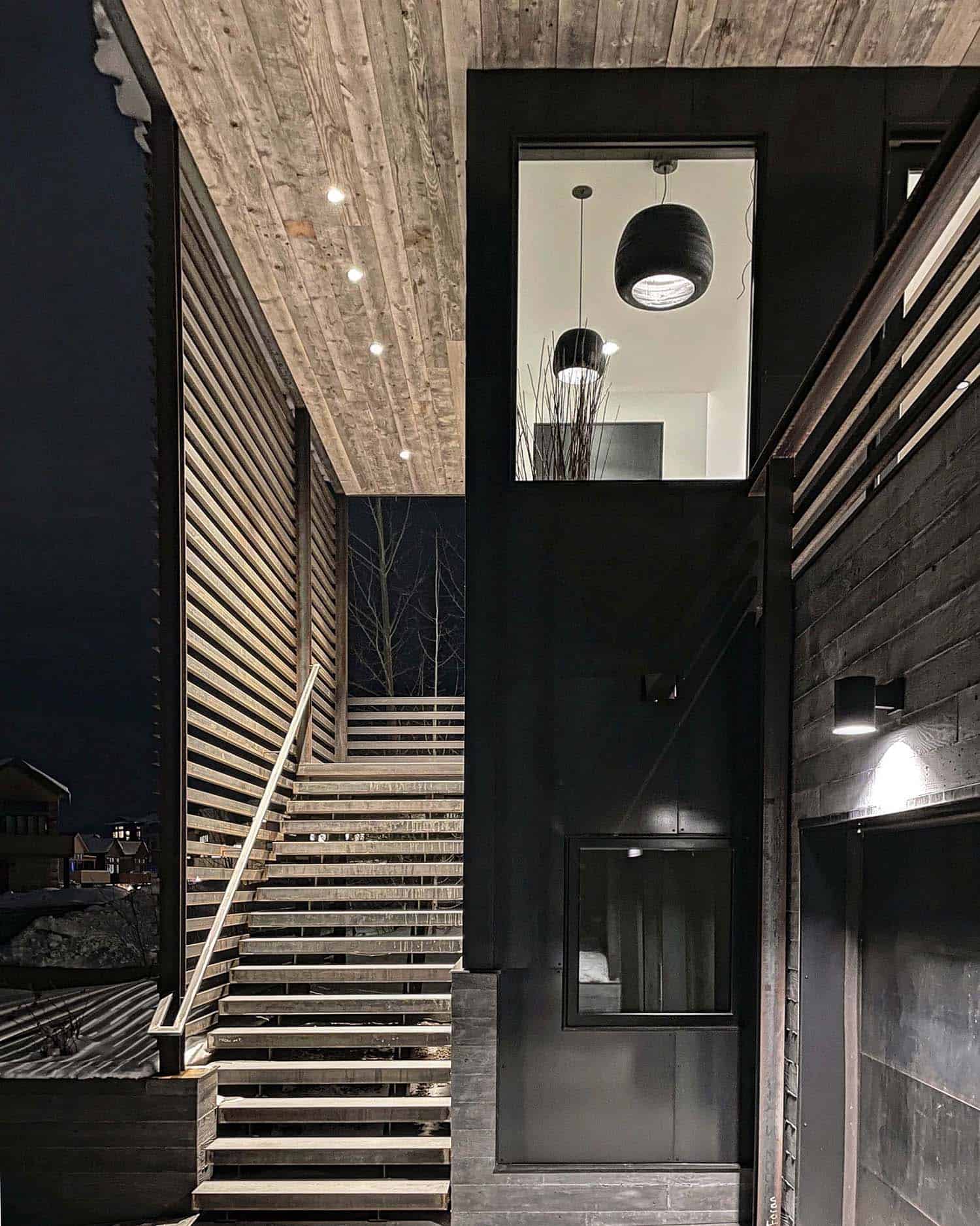 contemporary mountain home exterior with a staircase