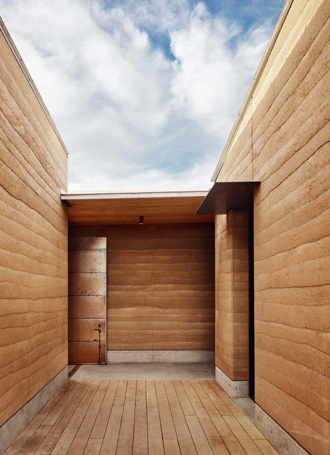 rammed earth ranch house entry