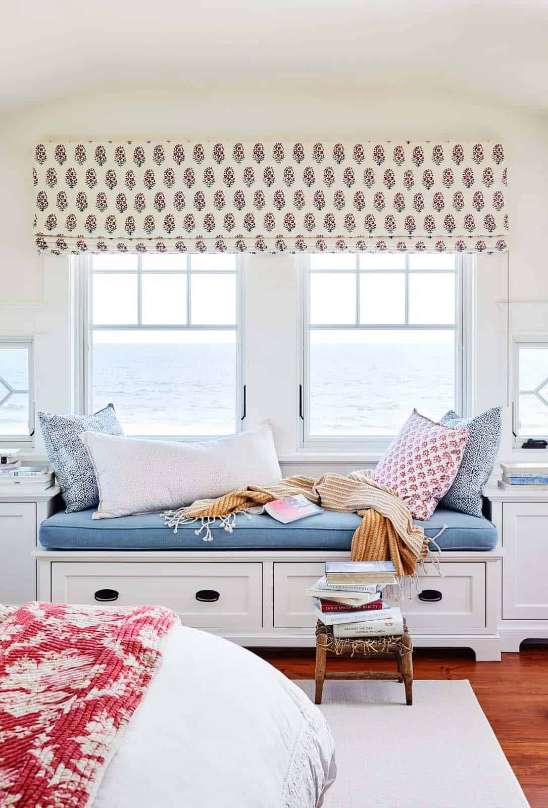 beach style bedroom with a window seat