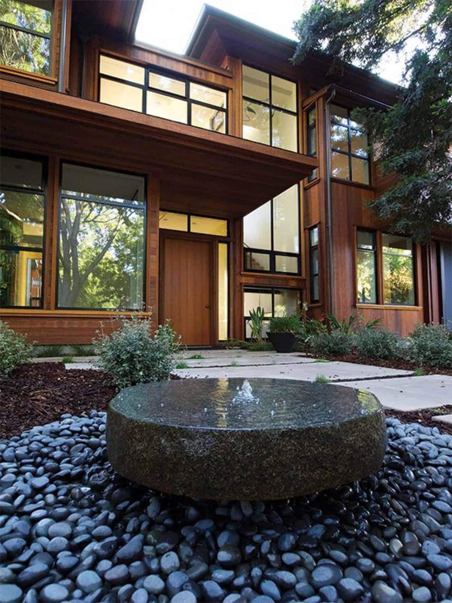 modern house exterior with a water feature