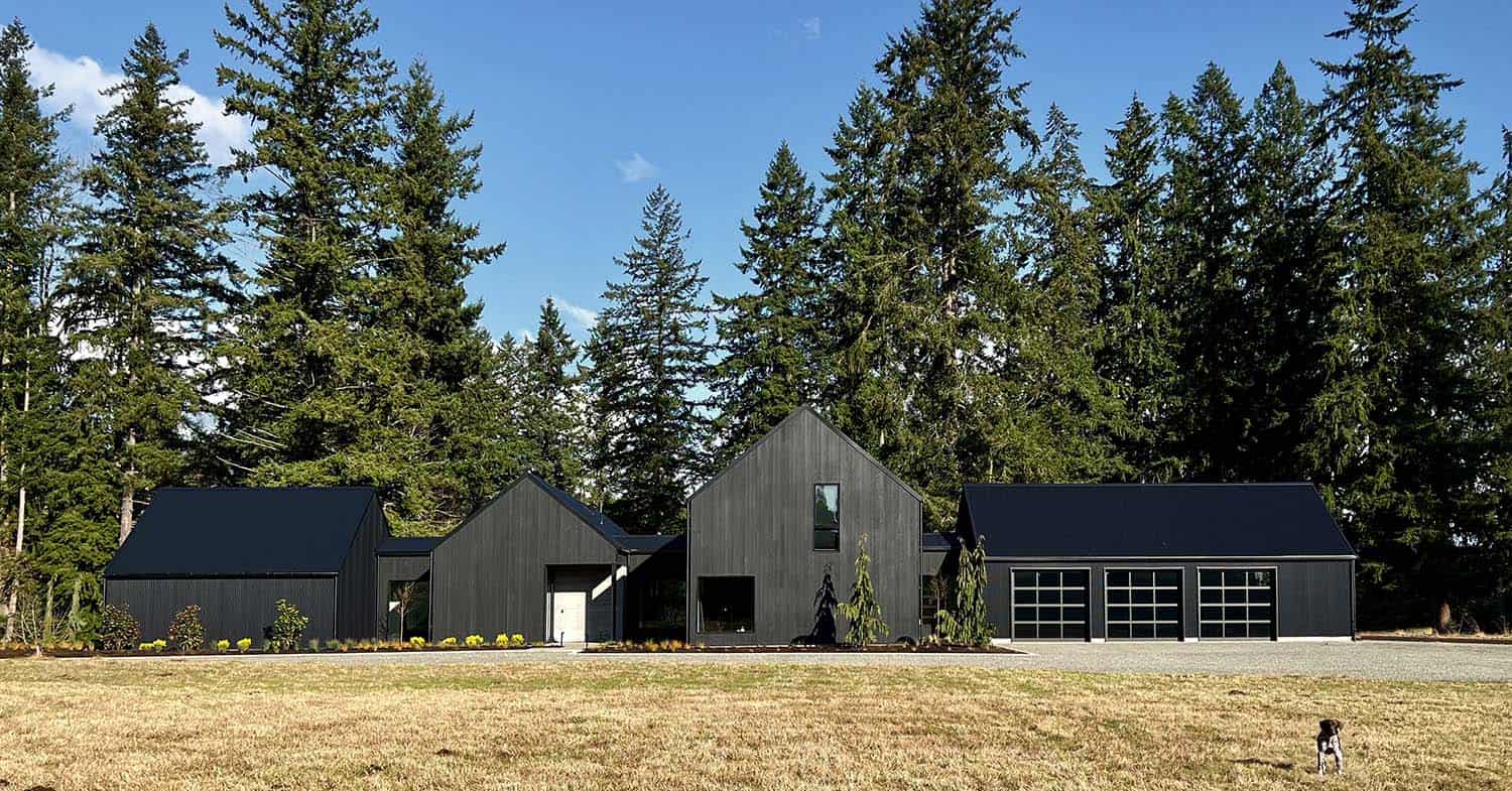 contemporary home exterior with black wood siding