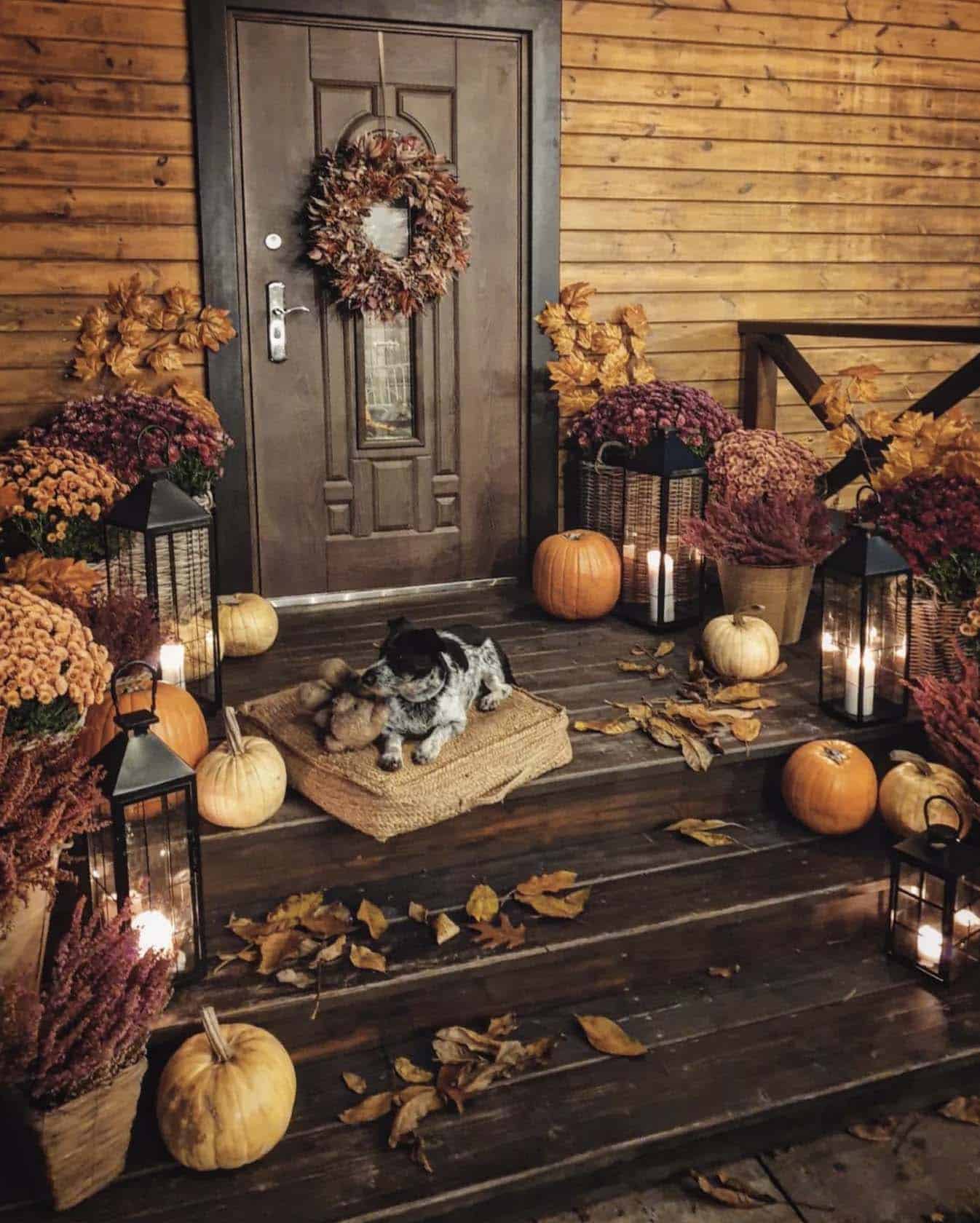 fall front porch with pumpkins, mums and lanterns