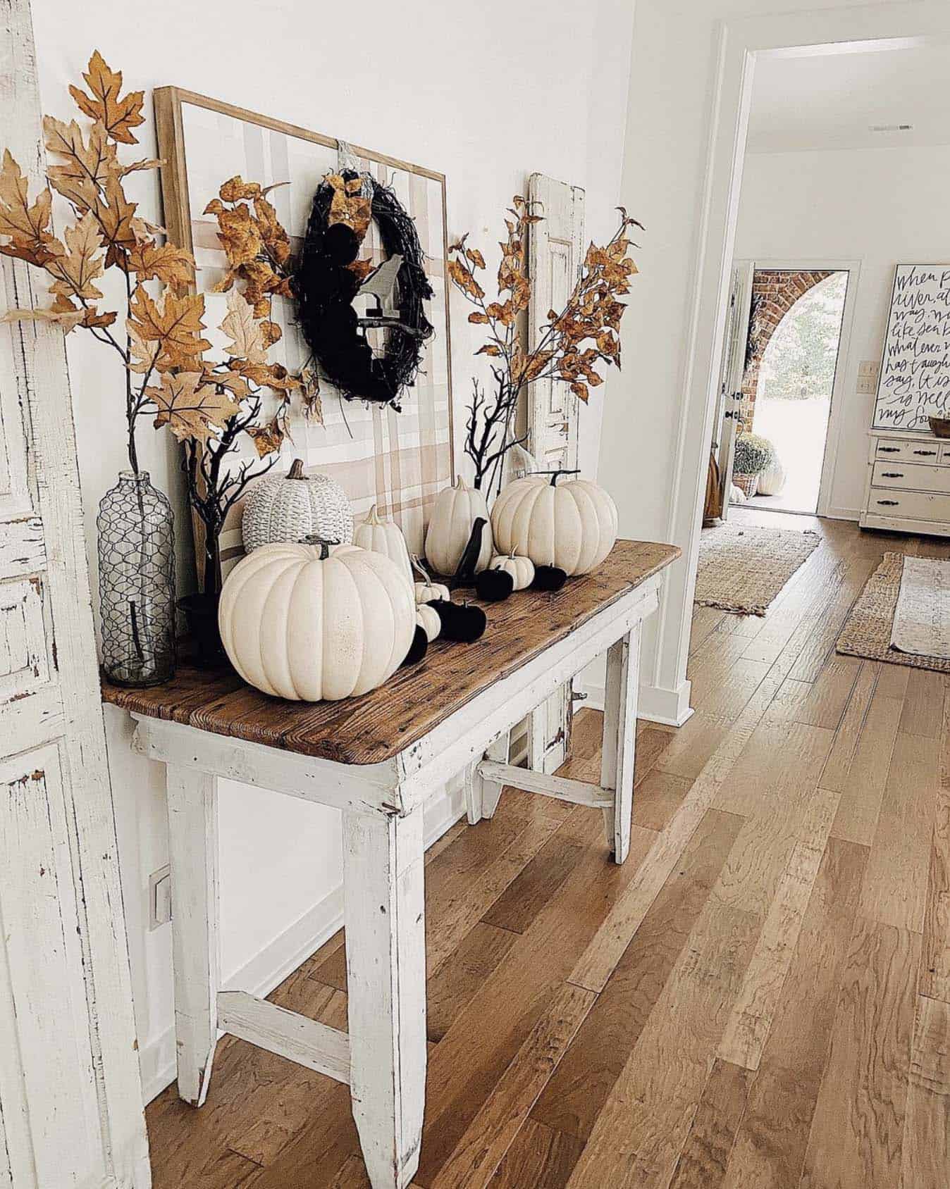 fall and Halloween decorated entry console table