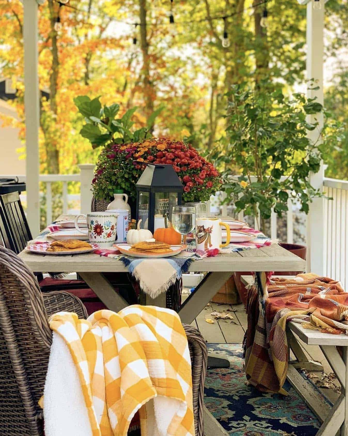outdoor dining on the porch with fall table decor