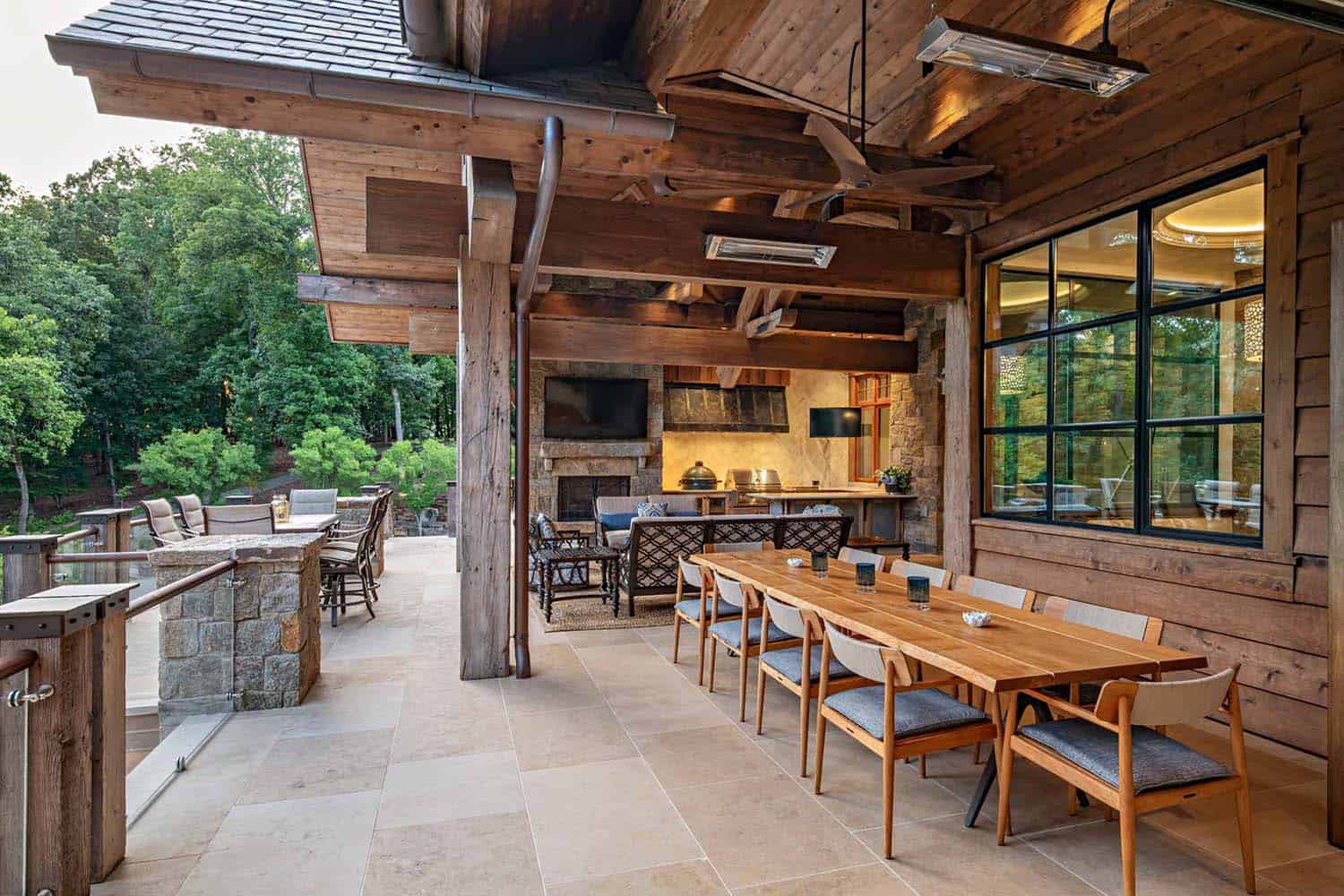 rustic covered porch with outdoor dining and lounging