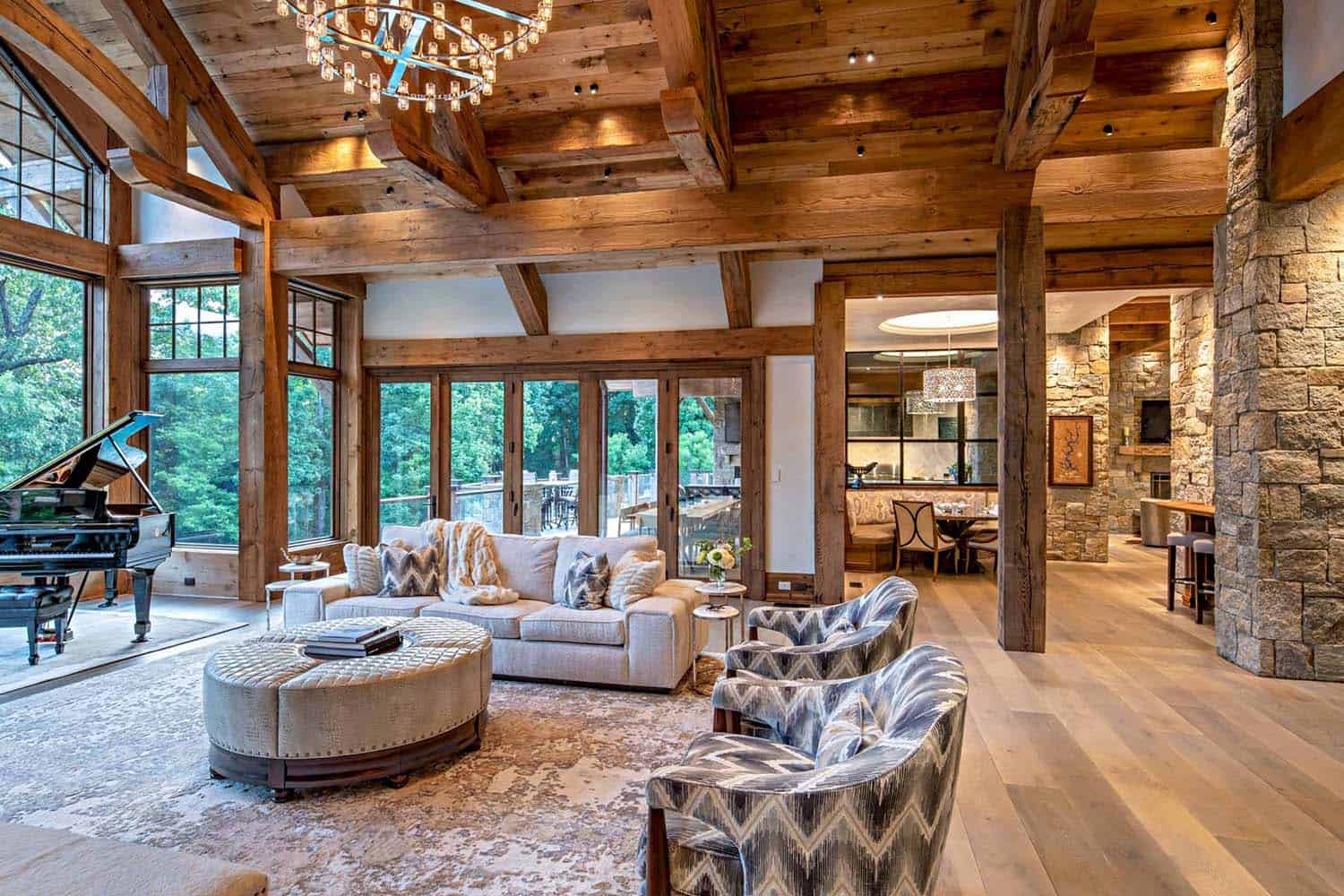 rustic living room with a large chandelier