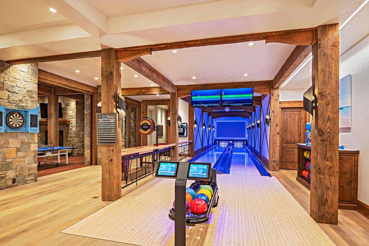rustic basement with a bowling alley