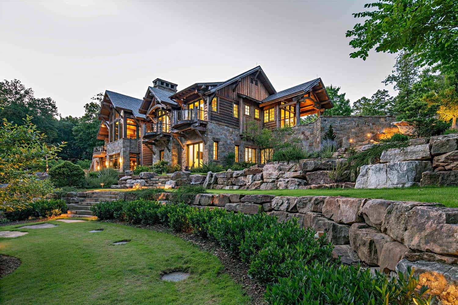 rustic lake house exterior with landscaping