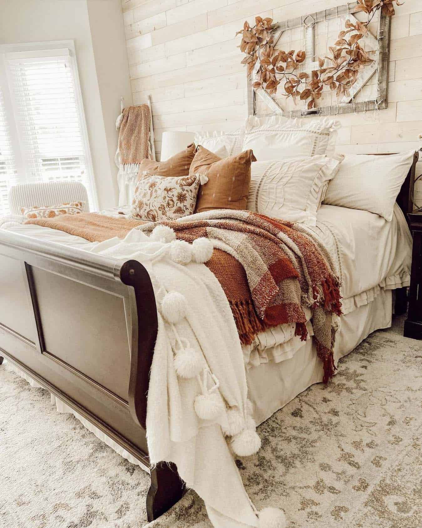 bedroom with warm fall tones and cozy textures