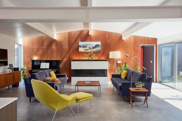 midcentury living room with a fireplace