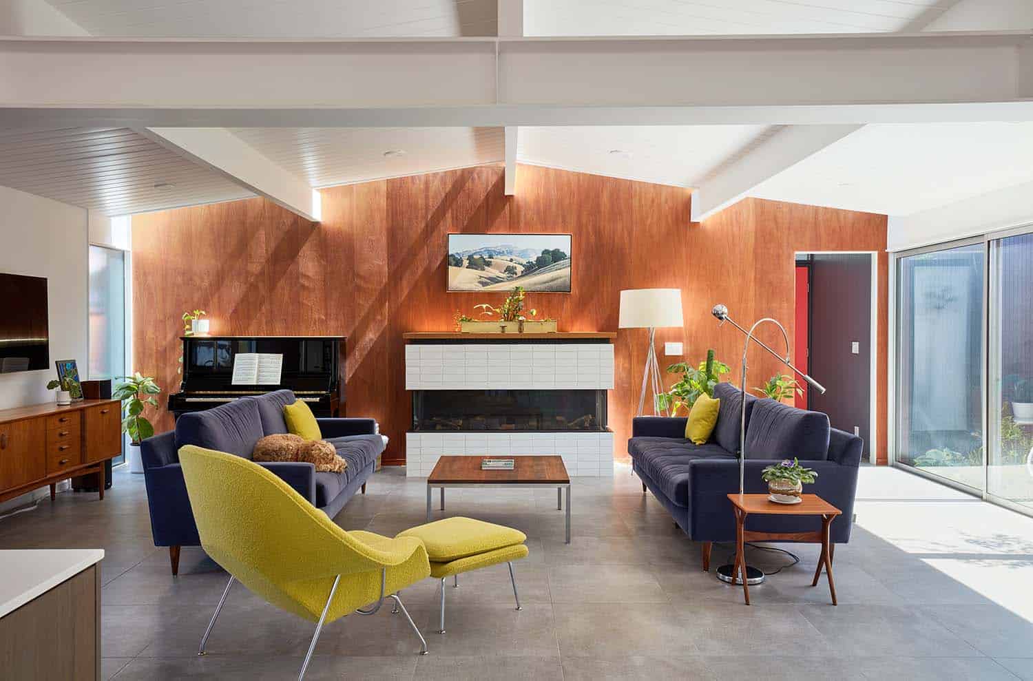 midcentury living room with a fireplace