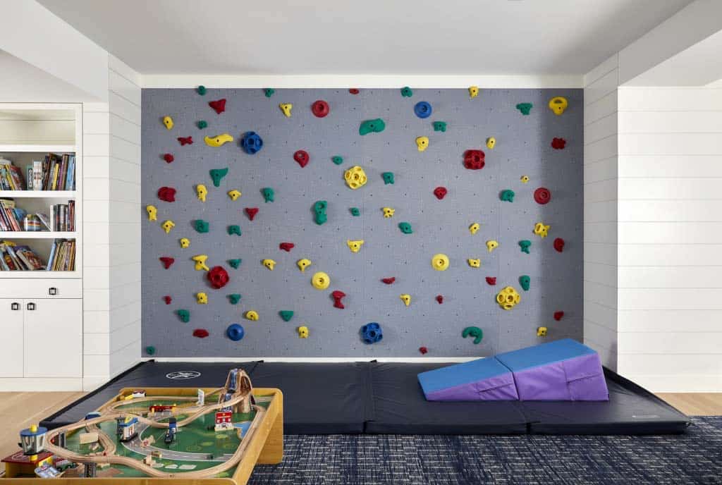 contemporary playroom with a climbing wall