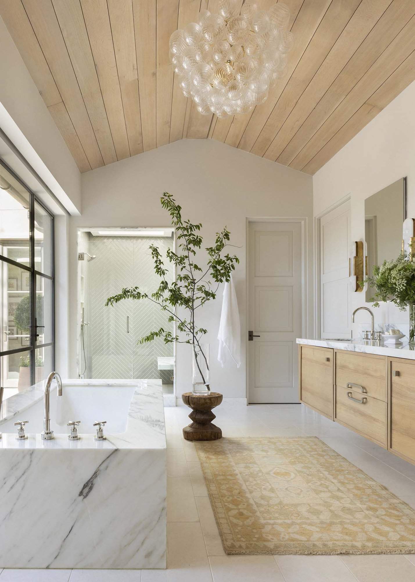 French provincial bathroom with a marble tub
