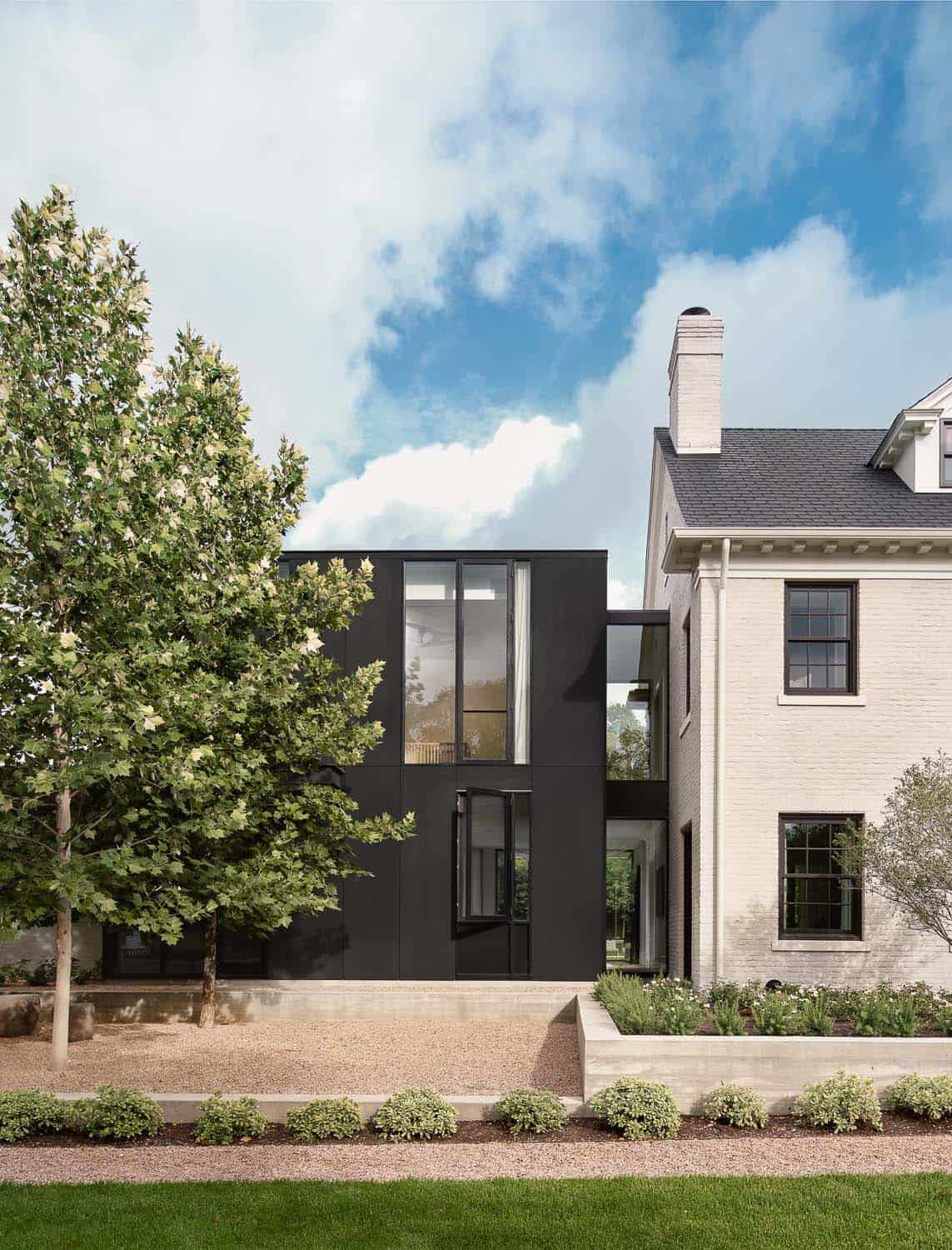 Georgian revival home exterior with a modern extension