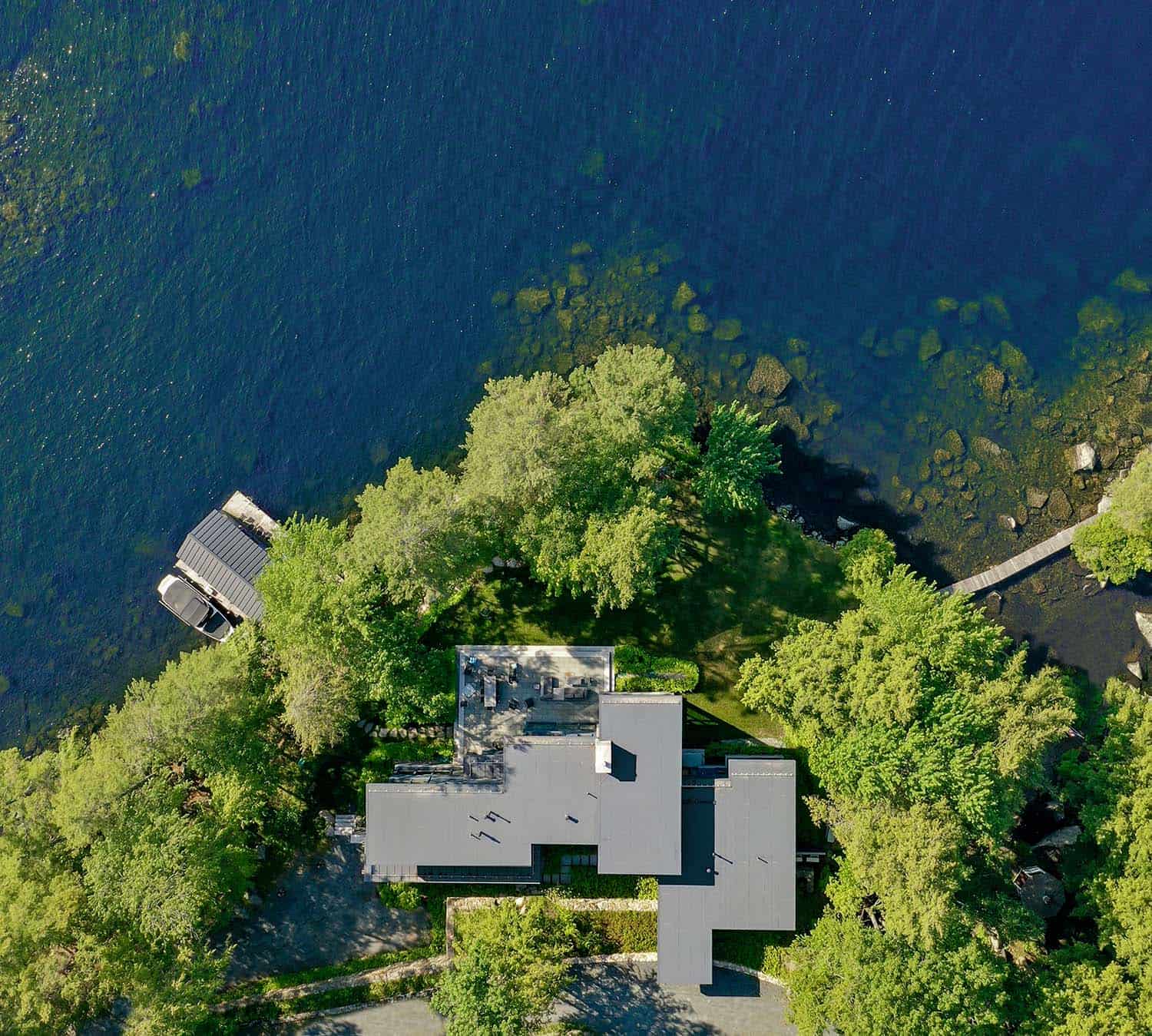 modern lake house exterior aerial view