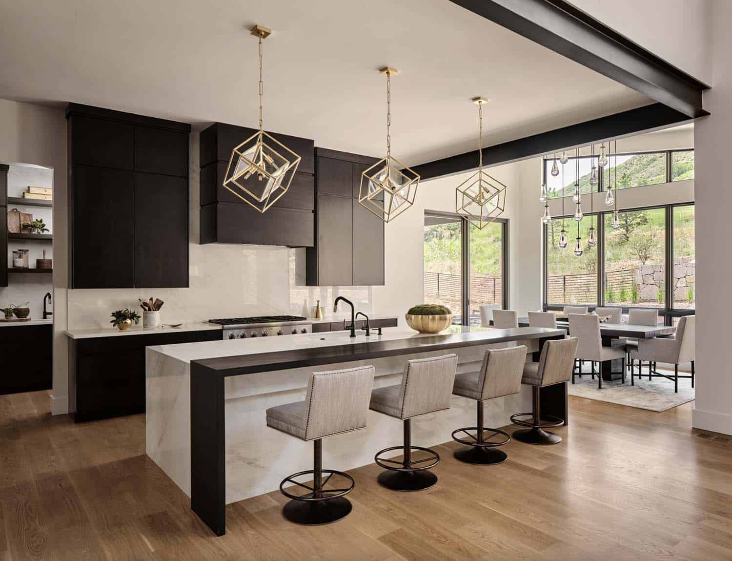 mountain modern kitchen with large pendant lights