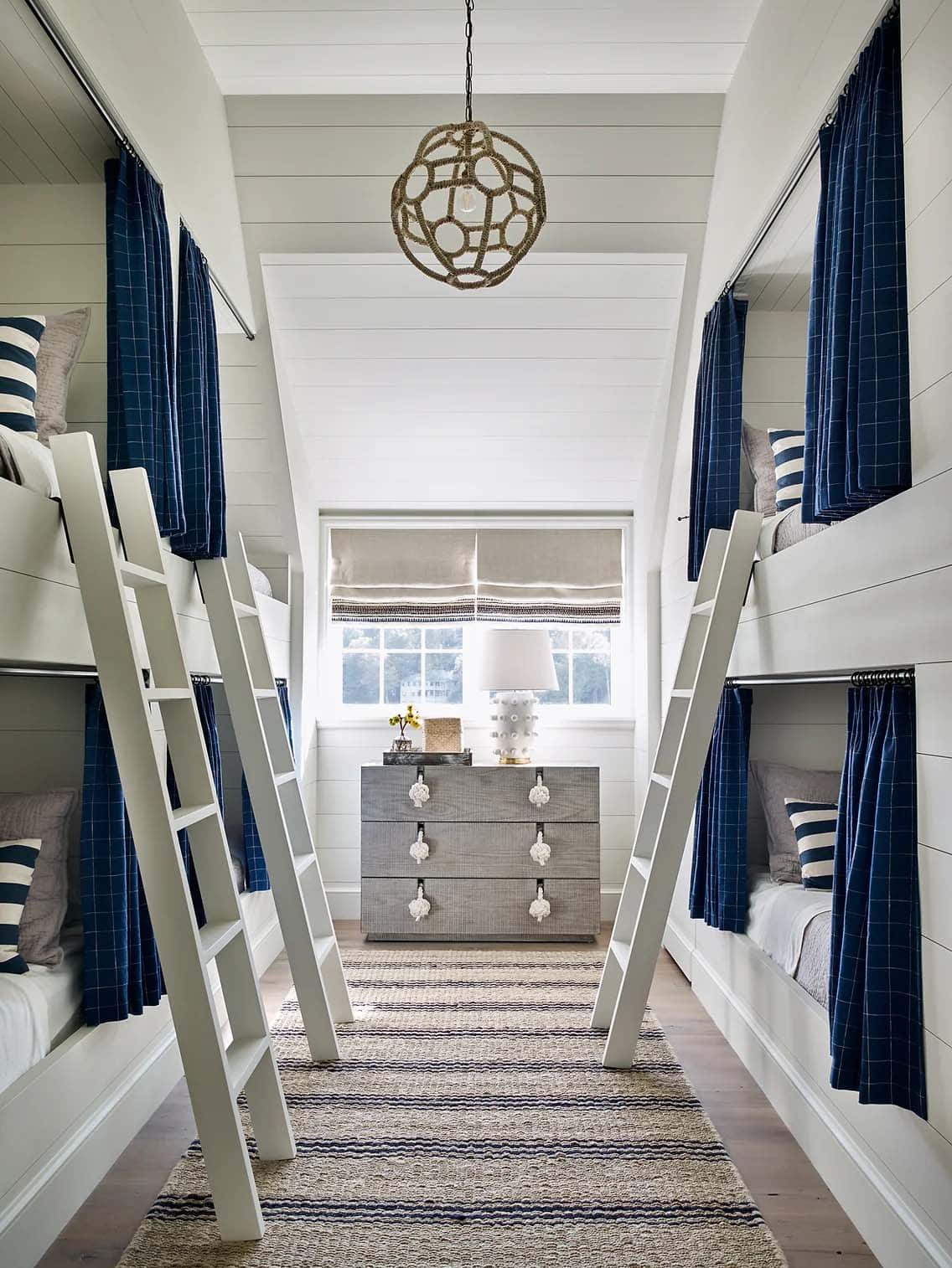 modern kids bunk bedroom in a blue and white color palette