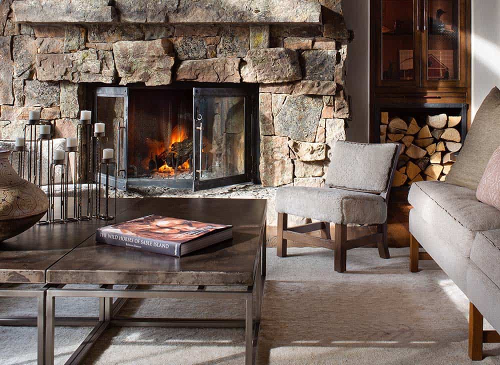 rustic modern living room with a stone fireplace