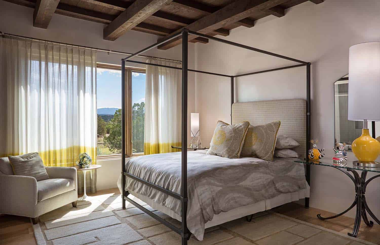 Santa Fe style bedroom with a canopy bed