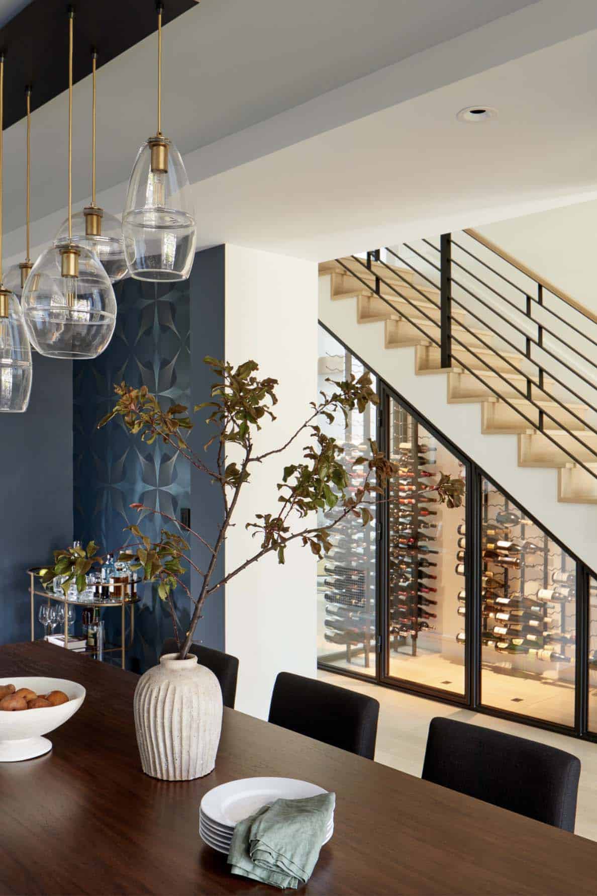 transitional dining room with a view of the staircase