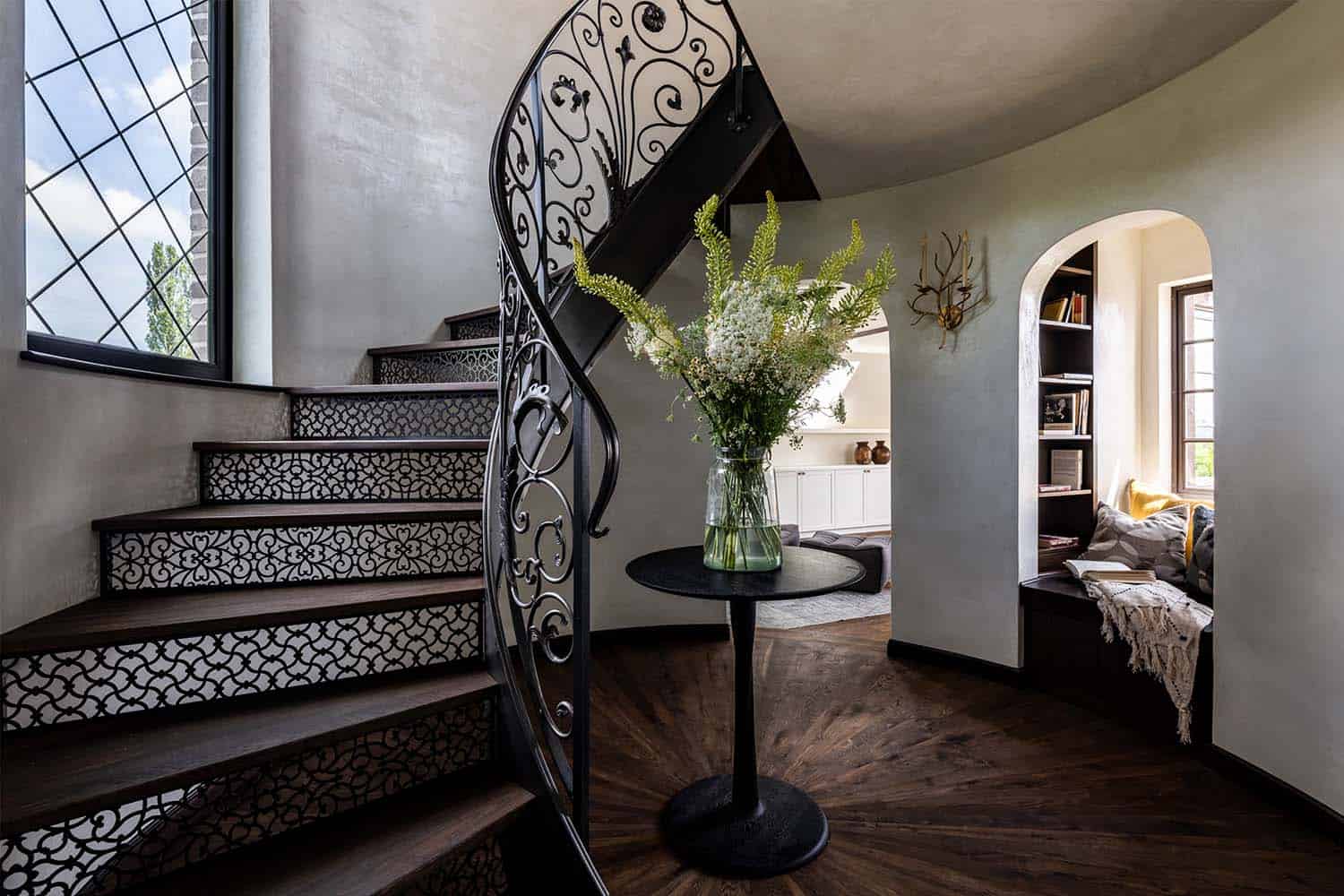 Tudor style staircase and a built-in window reading nook