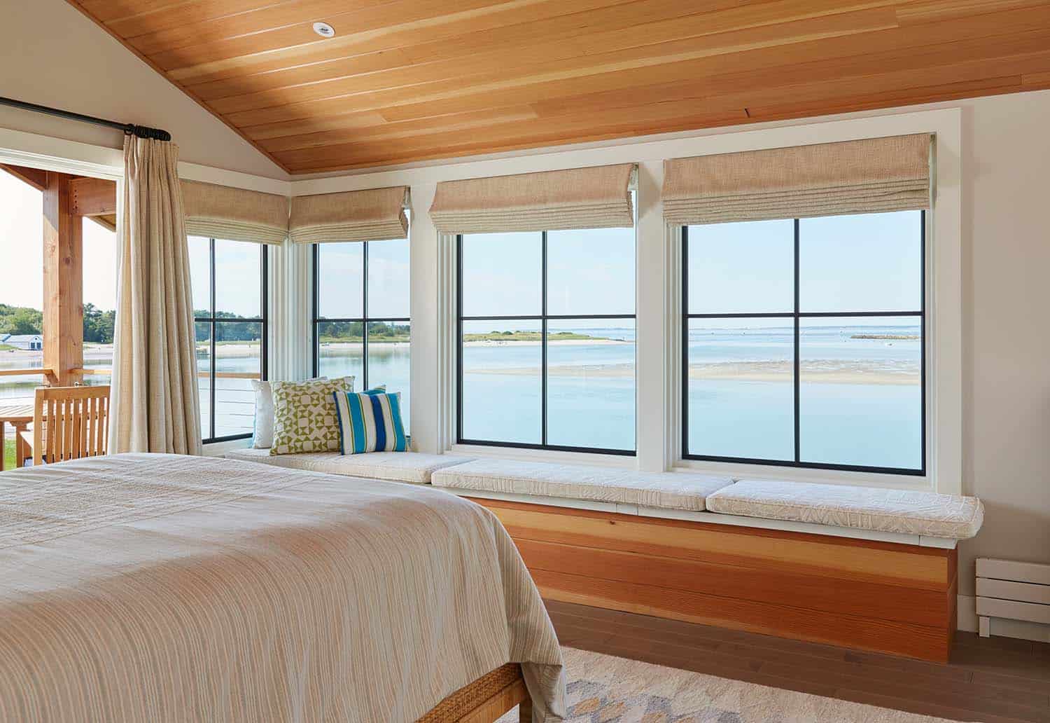 coastal style bedroom with a window seat