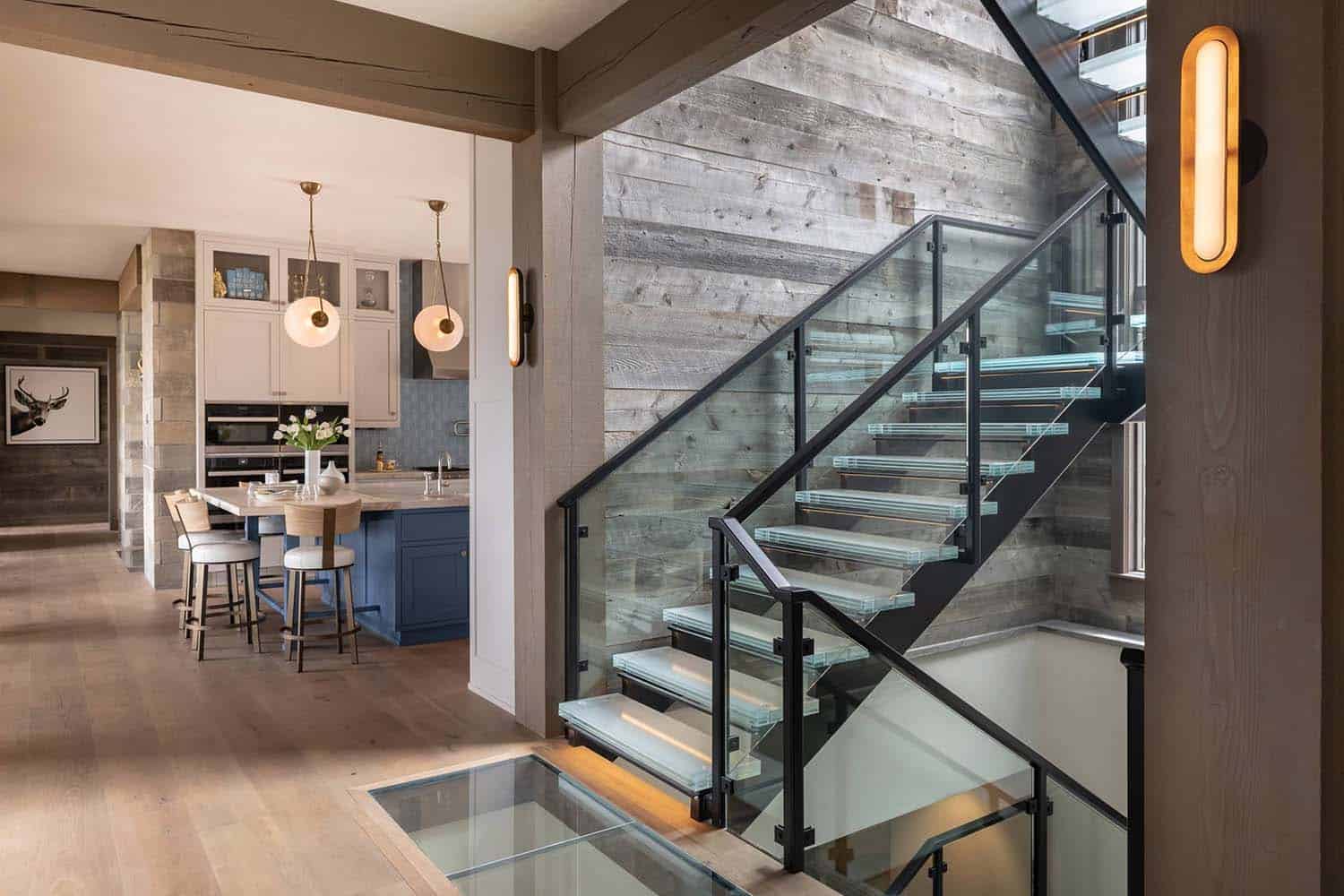 contemporary staircase with a view of the kitchen
