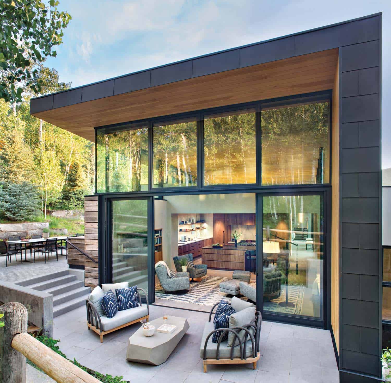 contemporary mountain home exterior patio with outdoor furniture