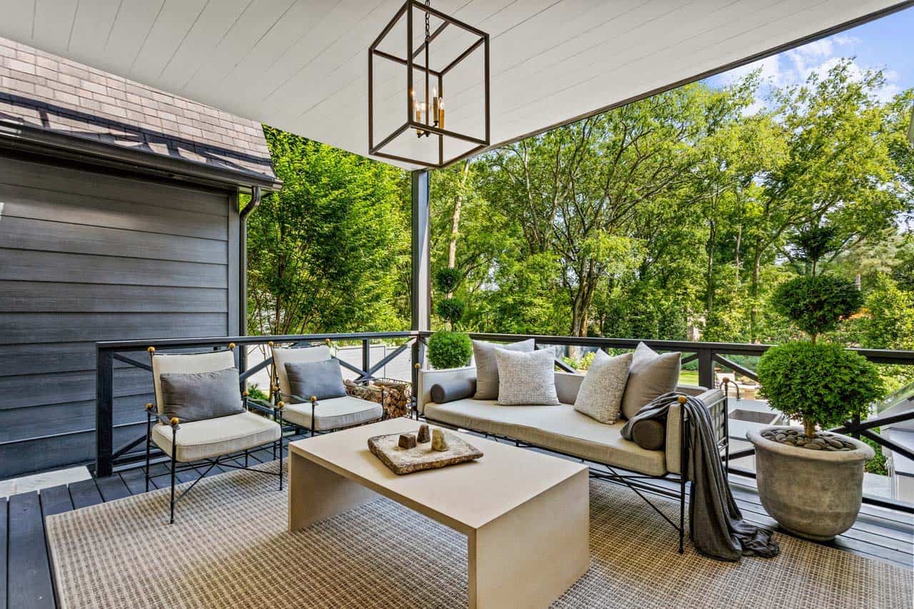transitional covered patio with outdoor furniture
