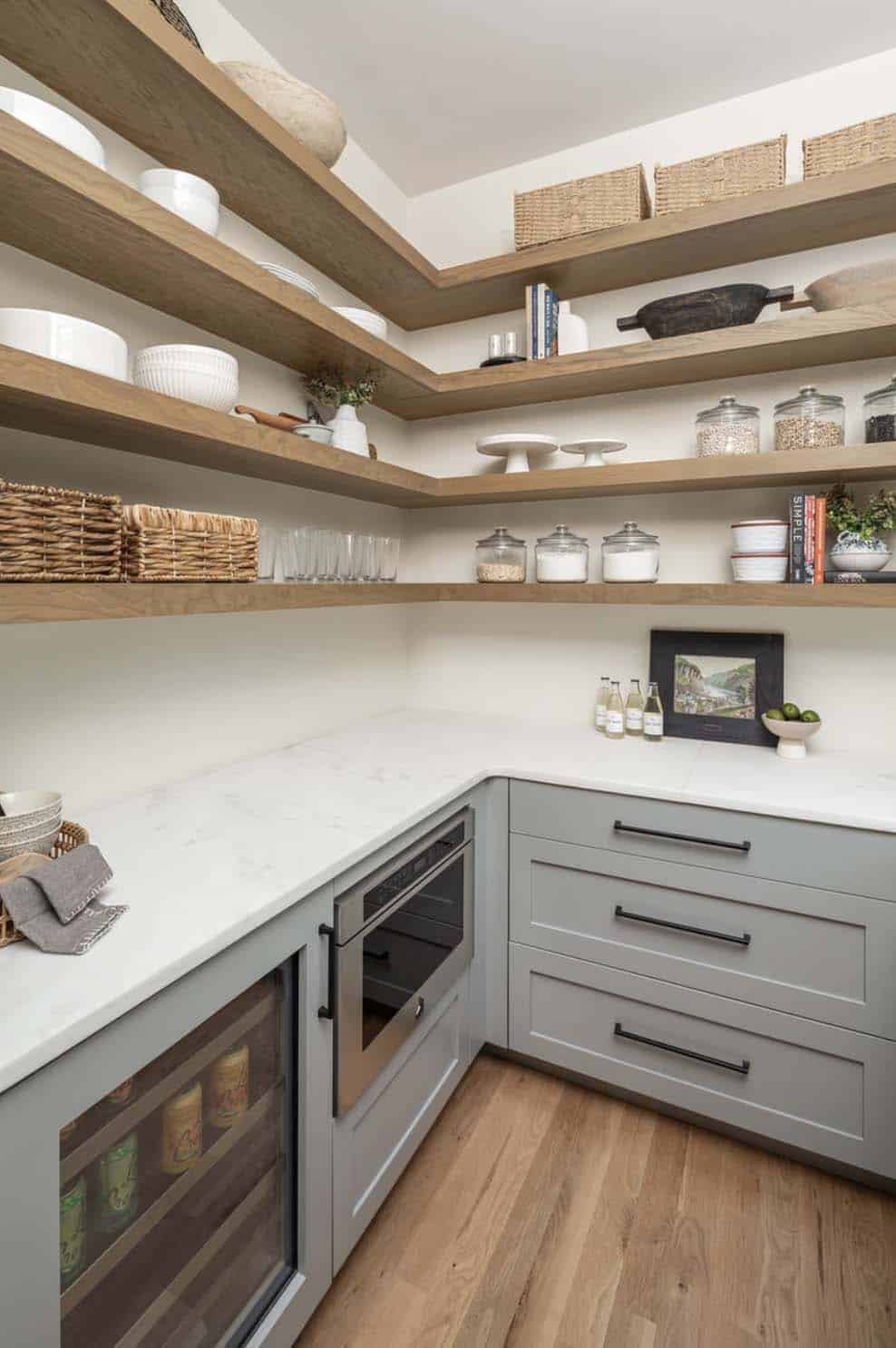 transitional kitchen pantry with gray cabinetry