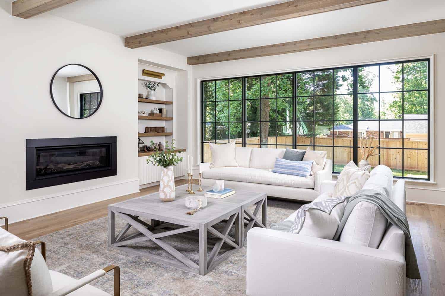 transitional living room with a gas fireplace